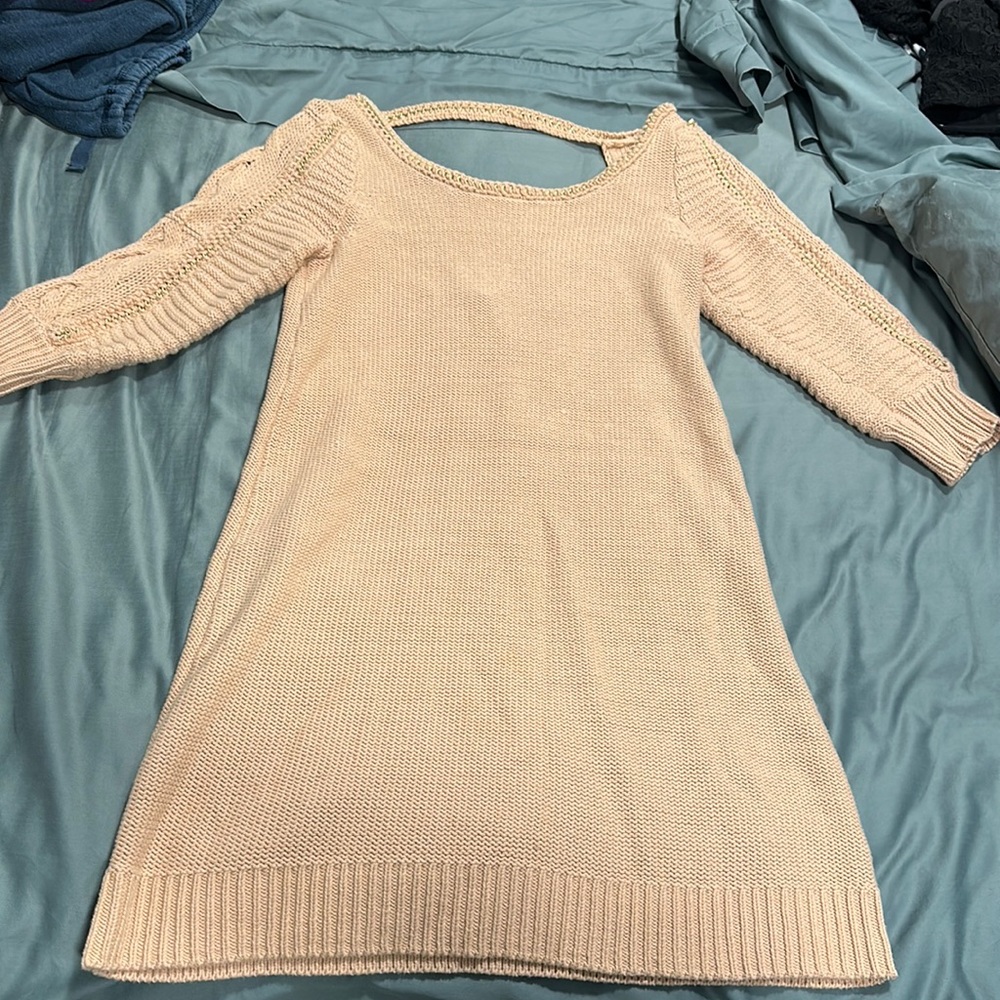 Lauren Conrad light pink with gold accent sweater dress. Scoop open back
